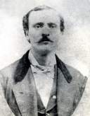 Jim Reed, Belles erster Ehemann stirbt 1874 in Paris, Texas